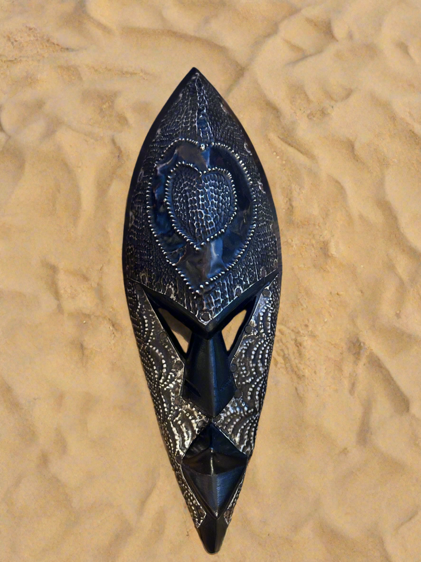 Akoma Face Carving